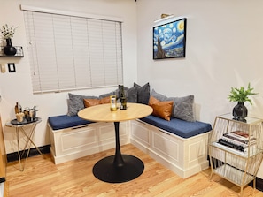 Stylish seating and art create a perfect spot for brunch or evening cocktails!