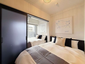 Double sized beds with clean and fresh linens.