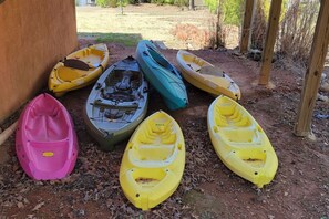 Our spacious backyard is packed with fun—kayaking, cornhole, and scenic sunset views.