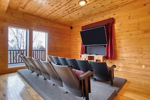 Enjoy movie nights in the cozy theater room with a big-screen experience!