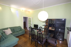 Living room overlooking the main street of Luino.