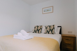 The Carthouse double bedroom at Trevalgan Farm Holidays