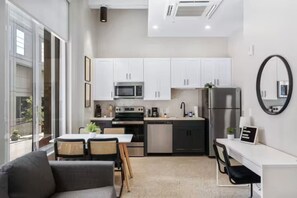 As you take a seat in the living room, the comfortable furniture and tasteful design make it easy to unwind.