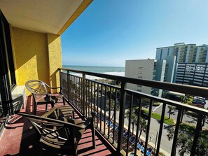 Wake up to ocean breezes and soak in the sunshine from your private balcony with stunning views of the beach and city—perfect for morning coffee or sunset unwinding.