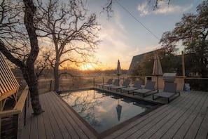Shared pool space for our treehouse units, with propane grill and ice maker.