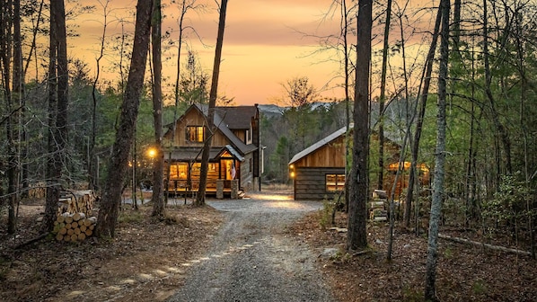 Tucked away behind the trees, The Catahoula Cabin offers a private mountain retreat with sunset views that greet you on arrival.
