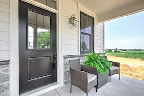 Front porch with wicker furniture