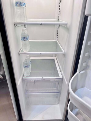 The fridge has a shelf assigned to each private room guest.