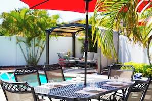 Poolside dining is a nice way to relax after a day at the beach.
