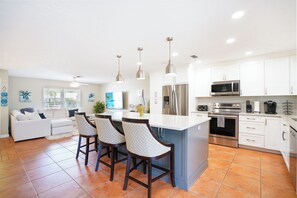 The large, well-appointed kitchen makes dining in easy and fun.
