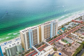 Majestic Beach Resort in Panama City Beach, Florida, offers an unparalleled coastal experience with its prime location along 650 feet of private, sugar-white sand beaches and the mesmerizing emerald green waters of the Gulf of Mexico.