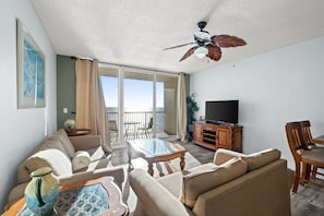 Step into the heart of this coastal retreat—an inviting living room designed for relaxation and connection.