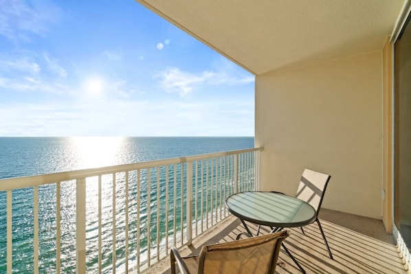 Step out onto the private balcony and take in the breathtaking beauty of the emerald green Gulf waters stretching out before you.