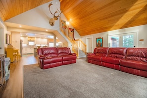 Spacious living room with unobstructed views of the Kenai River (1)