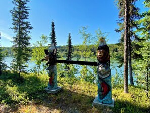 Hang your fresh catch from the custom carved Alaskan themed totems!