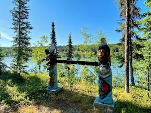 Hang your fresh catch from the custom carved Alaskan themed totems!