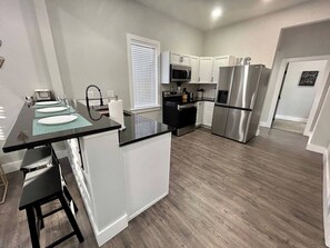 Beautiful, FULLY STOCKED kitchen and breakfast bar