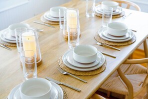 Stylish speckled stoneware offers a refined table setting