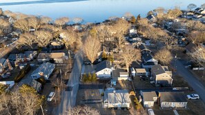 Gorgeous aerial view highlighting the home's proximity to scenic Green Pond.