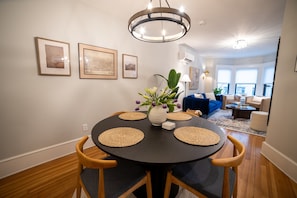 Open dining room next to living room so all your guests can be together in the common space.
