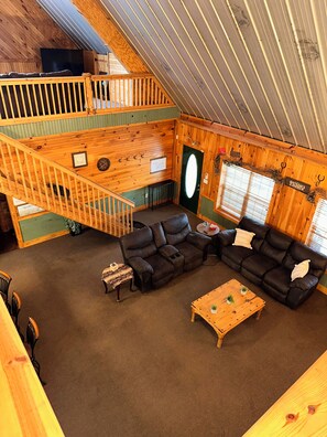View into the living room from the loft bunk bed bedroom.