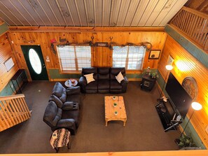 View of the living room from the center of the loft.
