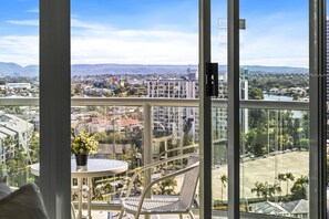 Enjoy your morning coffee in this cozy balcony overlooking the Gold Coast