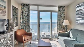 Sit in the living room and absorb the gorgeous oceanfront view