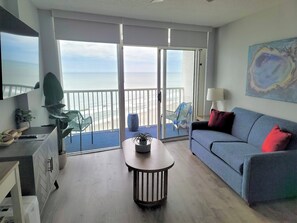 Living Room has Sofa Bed and Murphy bed with gorgeous ocean views and access to the balcony.