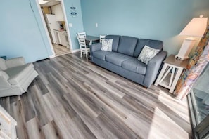 Pull out sofa bed in living room for extra sleeping space.