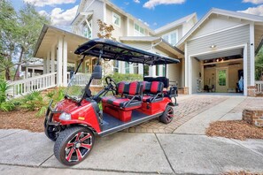 A 6 seater golf cart included in the rental.