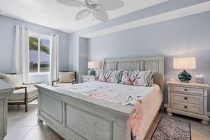 Primary bedroom with 55" Smart TV & ensuite
