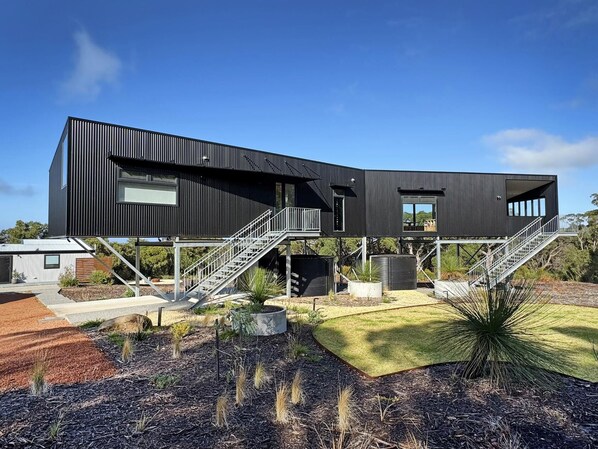 Welcome to Lights Lookout! The elevated main house and optional Studio to the left front.