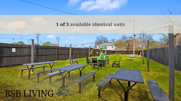 “Games Galore in the Backyard” From ping pong and mini soccer to cornhole and a full playset, the shared backyard is packed with activities to keep both kids and adults entertained.