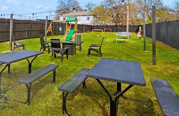 “Games Galore in the Backyard” From ping pong and mini soccer to cornhole and a full playset, the shared backyard is packed with activities to keep both kids and adults entertained.