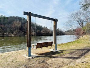 Just across the street, you can enjoy the sounds of the French Broad River with several places to relax. There's a walking path as well as a playground to enjoy. 