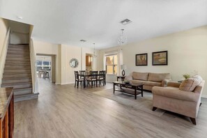 Bright and cozy living room with dining room. 