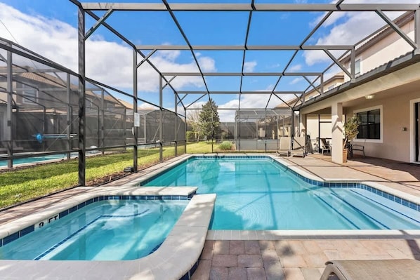 Amazing pool area with screen.