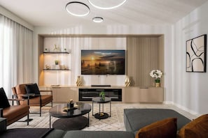 Stunning luxury living room with stylish decor features an electric fireplace and inviting pool view.