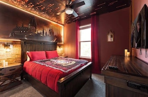 Magical Harry Potter-themed bedroom with enchanting decor and a cozy queen-size bed.