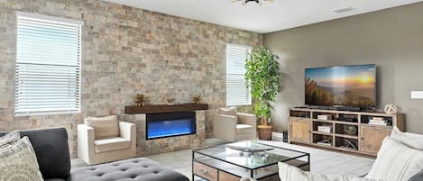 Stupendous and gorgeous family gathering, perfect blend of modern style with a Electric Fireplace emphasize comfort, functionality and practicality. The modern decoration has a sense of sophistication and elegance.