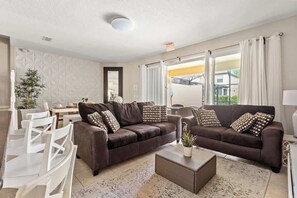 Absolutely charming view of kitchen, living room and dining area
