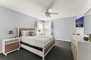 Master King size Bedroom with private bathroom and TV.