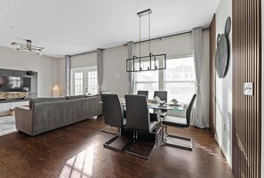 A beautifully decorated six-seat dining table.