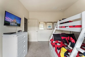 Enjoy the magic of Disney with our Mickey Mouse-themed bedroom, with a bunk bed and TV.