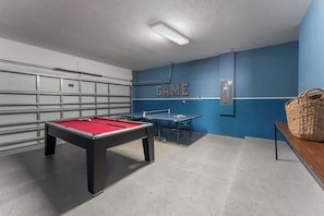 A game room perfect for spending time with family, offering entertainment options for all ages.