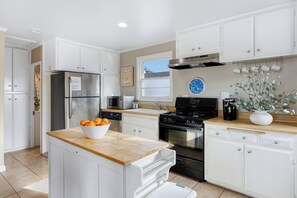 Full kitchen with everything you need to cook, dine, and feel at home.