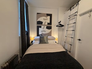 You'll love waking up to the cool abstract art on the back wall! It's surprisingly calming and sets the perfect tone for a relaxing getaway.