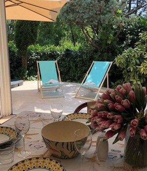 dining area, terrace with Jacuzzi and loungers