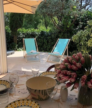 dining area, terrace with Jacuzzi and loungers